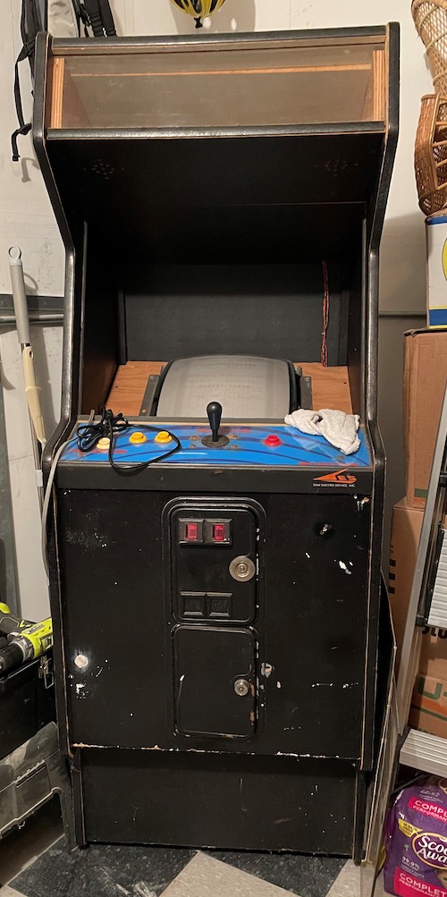 arcade machine with scrapes and original crt